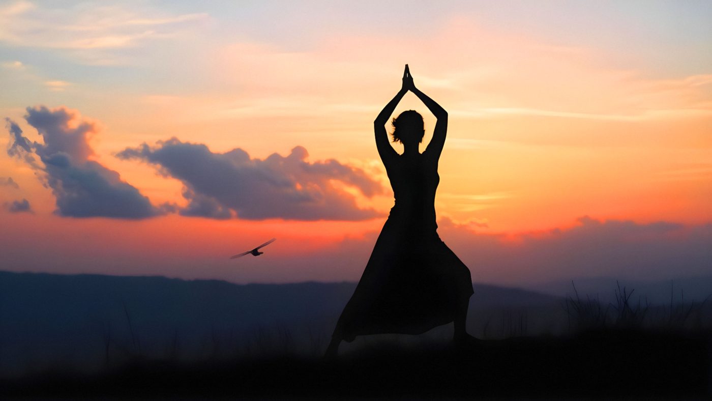 Yoga silhouette at sunset