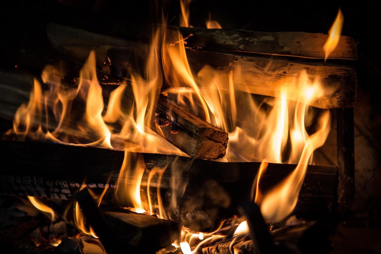 Campfire flames at night